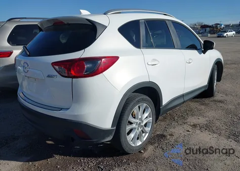 2013 Mazda Cx-5 Grand Touring z USA, uszkodzony, nr VIN JM3KE4DE0D0149237